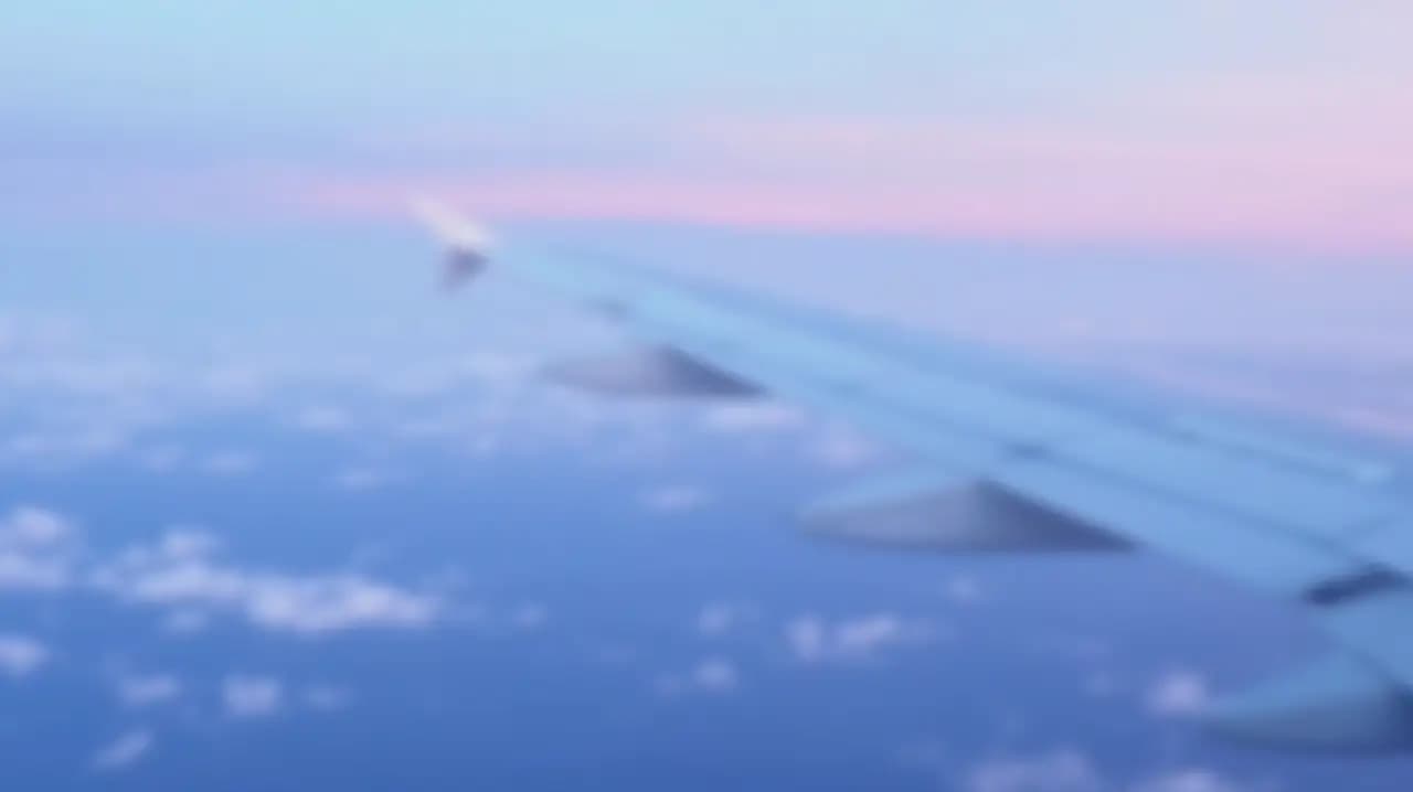 clouds and airplane wing